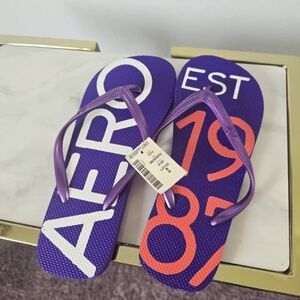 Aeropostale Printed Purple Flip Flops Women’s Size 8.